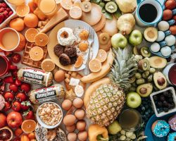 assorted fruits on brown wooden bowls
